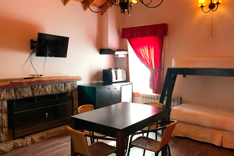Living con cocina del apart suite